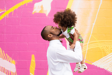 Father sharing special moment with daughter