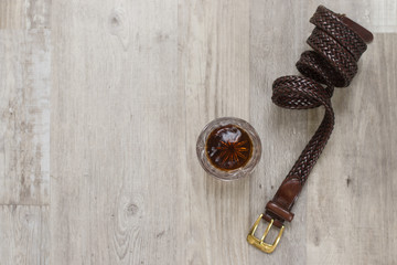 Men's Lifestyle Flat Lay with Belt and Drink