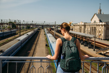 girl looks on railways