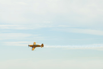 Yellow turboprop sport plane flies under the radar.