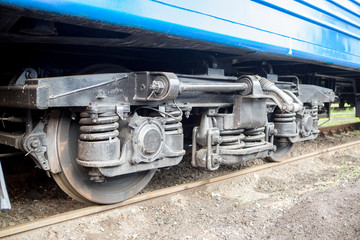 wheels of the railway car. Wheelbase of the train car close-up