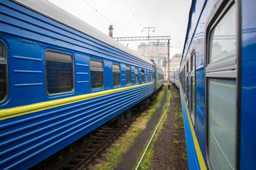Fototapeta premium Classical cars of passenger train from outside. Many passenger cars.