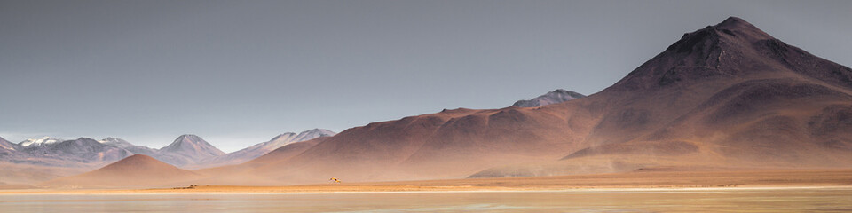 amazing stone desert with mountains at golden hour   Panorama   Altiplano, Bolivia © vorkaPICTURE