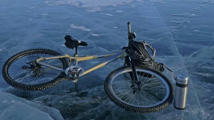 Man and his bicycle on ice. He looks at the beautiful ice in the cracks. First-person view. The cyclist is dressed in a gray down jacket, backpack and helmet. Ice of the frozen Lake Baikal. The tires