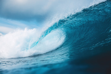 Ocean barrel wave in ocean. Breaking wave for surfing in Bali