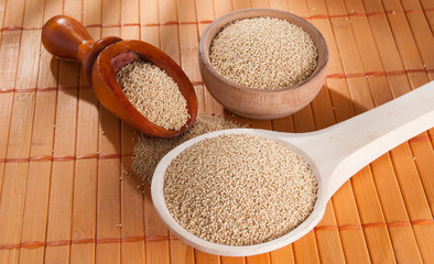 Raw Organic Amaranth grain on wooden table