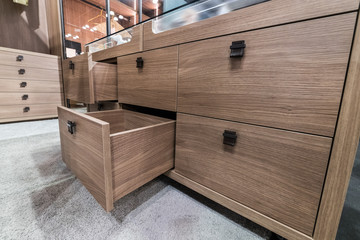 Wooden cabinet drawer box in bedrom luxury dressing room - obrazy, fototapety, plakaty