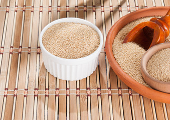 Raw Organic Amaranth grain on wooden table