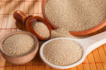 Raw Organic Amaranth grain on wooden table