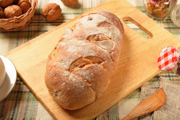 Cranberry  hearth bread  on a cutting board 