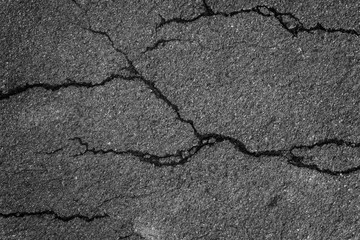 Crack background texture of rough asphalt