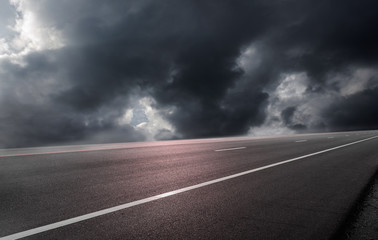 Road asphalt on cloud storm