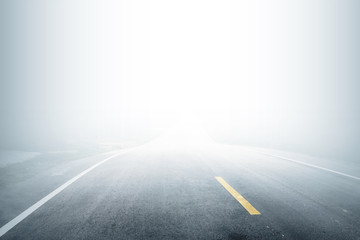 Road with fog in the morning