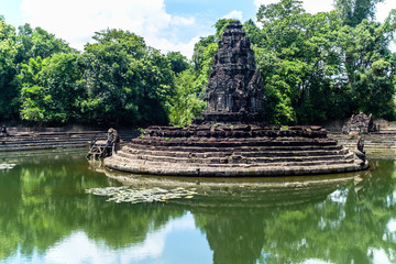Fototapeta na wymiar Neak Pean Temple (The entwined serpents) is an artificial island with a Buddhist temple at Siem Reap Cambodia.