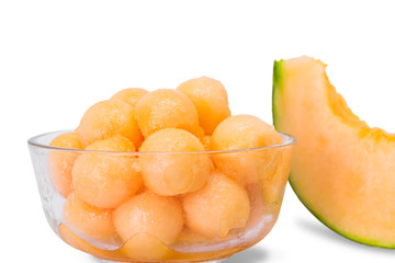 Fototapeta na wymiar Cantaloupe melon in scoop of flesh and in slice