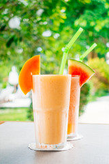 Watermon fruit and papaya juice smoothies in glass