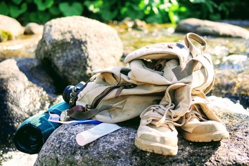 Morning toilet is a tourist. Toothpaste, toothbrush mountain river. Tourist equipment