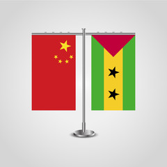 Table stand with flags of China and Sao Tome and Principe.Two flag. Flag pole. Symbolizing the cooperation between the two countries. Table flags