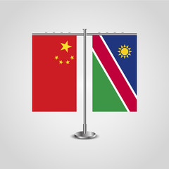 Table stand with flags of China and Namibia.Two flag. Flag pole. Symbolizing the cooperation between the two countries. Table flags