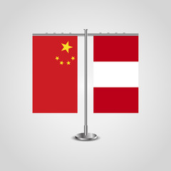 Table stand with flags of China and Peru.Two flag. Flag pole. Symbolizing the cooperation between the two countries. Table flags