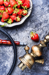 Stylish oriental shisha with strawberry