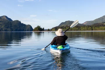 Foto op Canvas Kayaking during a vibrant morning surrounded by the Canadian Mountain Landscape. Taken in Stave Lake, East of Vancouver, British Columbia, Canada. © edb3_16
