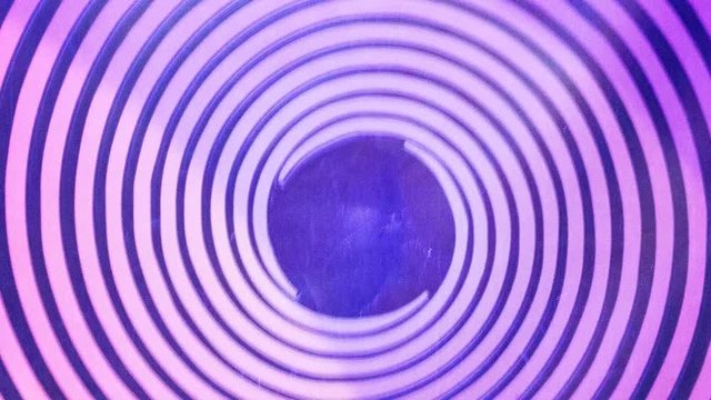 Radiating from the center of the concentric neon circles. The footage in the UV light. Dynamic, motion animation