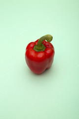 Red Sweet pepper on a green background