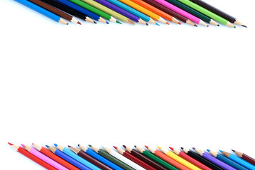 Colorful pencils, pastel and gouache isolated on white background with copy space. Drawing concept.