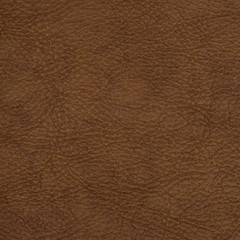 Light brown leather texture surface. Close-up of natural grain cow leather Light brown leather texture surface.