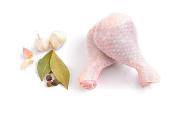 Raw chicken legs isolated on white background.