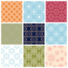Seamless backgrounds with floral patterns. Colored set.