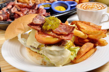 Beef Burger with bacon and tomato on a plate 