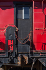Back door of the old locomotive wagon. Locomotive door details. View to the door of the steam locomotive
