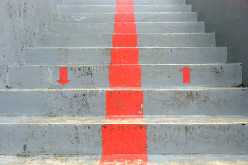 The red symbol up and down at  dark gray stage,red arrow