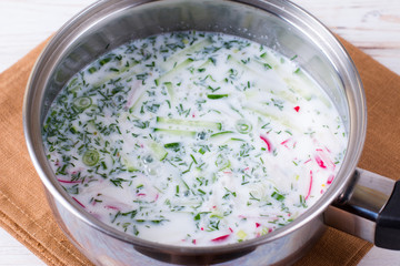 Soup cold, okroshka in saucepan