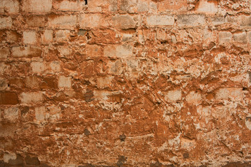 very old dilapidated brick wall