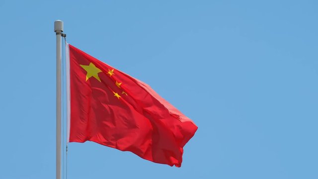 Chinese Flag With Blue Sky
