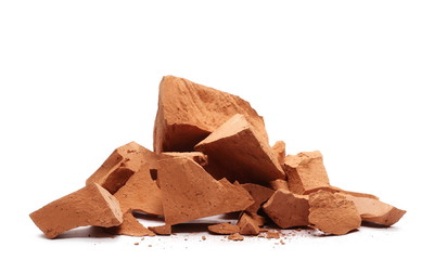 Shattered brick pieces isolated on white background