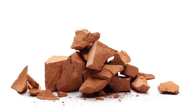 Shattered brick pieces isolated on white background