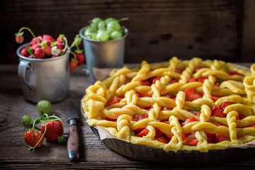Closeup of delicious and crispy pie with fresh berry fruits