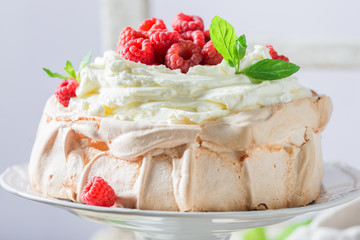 Sweet Pavlova dessert made of mascarpone and berries
