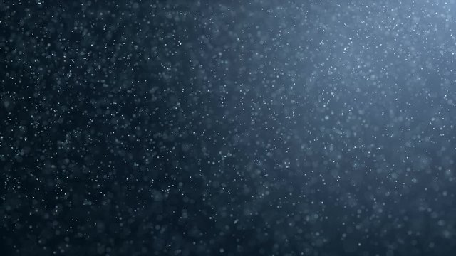 Floating organic dust particles shimmering on a black background. Particles swirling randomly as if blown by wind Particles moving quickly through space, each particle independently Dynamic particles.