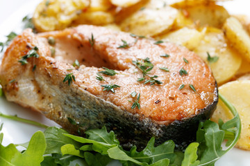 Roasted  salmon with  potatoes.