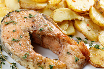 Roasted  salmon with  potatoes.