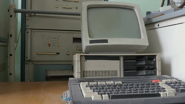 Retro old fashioned personal computer. Dusty pc
