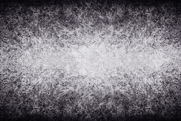 Black and white grunge textured concrete wall style. Dark edges