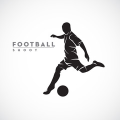 silhouette football player dribbling the ball and ready to shoot