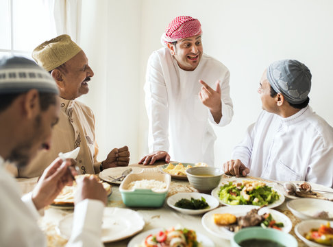 Muslim men celebrating ending of Ramadan