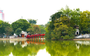 HANOI, VIETNAM - DECEMBER 16, 2016: Red bridge over a pond. Copy space for text.